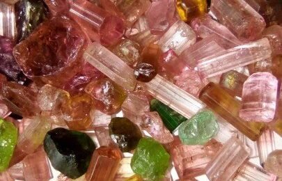 Experience the beauty of Nigerian tourmalines, a symbol of the country's untapped mineral treasures Image of vibrant tourmalines found in Nigeria, symbolizing the country's rich mineral wealth and emerging status as a global mining powerhouse