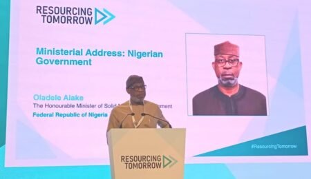 Solid Minerals Development Minister Dele Alake speaking at the Mines & Money Conference 2024 in the UK, promoting Nigeria's new geo-data platforms and investment opportunities in the mining sector. Minister Dele Alake addressing global mining executives at the Mines & Money Conference 2024 in the UK.