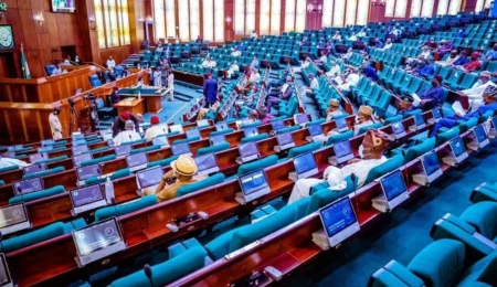 The interior of the Nigerian House of Representatives chamber, symbolizing legislative efforts to combat illegal mining and enforce license compliance.